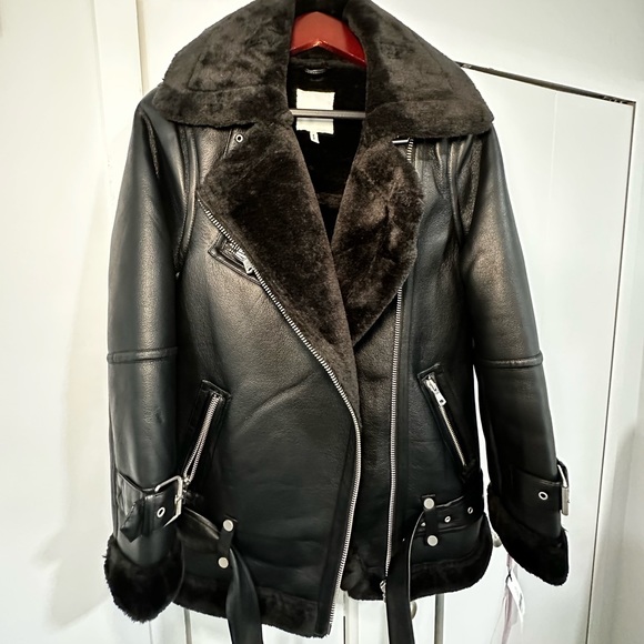 Beautiful and warm leather jacket- *not real leather*
